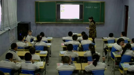 外研版(三起)小学英语六下Module5 Unit 1 He is playing the suona, but the phone rings.新疆王玉梅