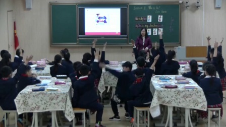 小学英语科普版三下《Lesson 8 Who is he-》河南  庆小霞