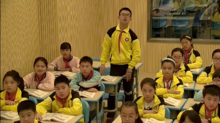 外研版(三起)小学英语六下Module5 Unit 2 He’s riding his bike, but it starts to rain.广西李露