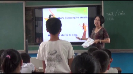 外研版(三起)小学英语六下Module5 Unit 2 He’s riding his bike, but it starts to rain.江西谭晓祯